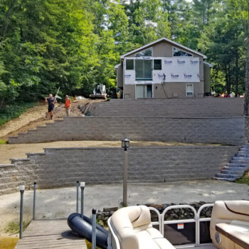 Tiered landscaping block retaining walls