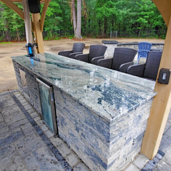 Block wall outdoor seating area bar