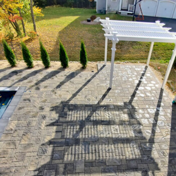 Pool area surrounded by stone pavers