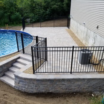 Raised stone patio and pool